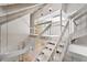 Upward shot of staircase with white handrail and light colored floors at 2770 S Elmira St # 2, Denver, CO 80231