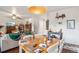 Cozy dining area connecting to the living room, perfect for Gathering meals at 5109 S Malta Way, Centennial, CO 80015
