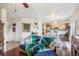 Open-concept living room flowing into the kitchen and dining area, great for entertaining at 5109 S Malta Way, Centennial, CO 80015