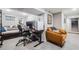 Cozy basement with desk, computer, chair and sofa offering comfortable and functional living and work space at 3881 Zenobia St, Denver, CO 80212