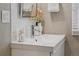 Bathroom features sleek sink with minimalist design, subway tile, and modern faucet fixture at 3881 Zenobia St, Denver, CO 80212