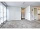 Bright living room shows carpet and light walls at 7260 S Gaylord St # E26, Littleton, CO 80122