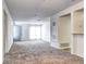 Spacious living room featuring plush carpet and ample natural light at 7260 S Gaylord St # E26, Littleton, CO 80122