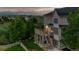 Spacious outdoor deck with stone pillars offers stunning views of the surrounding landscape at 3041 Starling Ct, Castle Rock, CO 80109