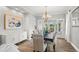 Formal dining room offers stylish decor, modern lighting and doors to the outside at 3041 Starling Ct, Castle Rock, CO 80109