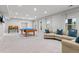 Spacious game room with a pool table, comfortable seating, and plenty of room for entertaining at 3041 Starling Ct, Castle Rock, CO 80109