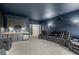 Entertainment at its finest in this home theater with seating and wet bar at 3041 Starling Ct, Castle Rock, CO 80109
