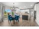 Spacious eat-in kitchen with stainless appliances, island, and natural light at 3041 Starling Ct, Castle Rock, CO 80109