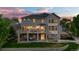 Beautiful home exterior featuring a deck, a patio, a well-maintained yard, and mature landscaping at 3041 Starling Ct, Castle Rock, CO 80109