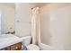 Bathroom featuring a tub-shower combo and a vanity with a sink at 2561 Cactus Bluff Pl, Highlands Ranch, CO 80129
