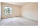 Bedroom with a window and carpeted floor at 2561 Cactus Bluff Pl, Highlands Ranch, CO 80129