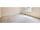 Bedroom with a window and carpeted floor at 2561 Cactus Bluff Pl, Highlands Ranch, CO 80129