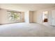 Spacious bedroom with a window and an en-suite bathroom at 2561 Cactus Bluff Pl, Highlands Ranch, CO 80129