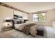 This main bedroom features neutral walls, carpet, and decor at 2561 Cactus Bluff Pl, Highlands Ranch, CO 80129
