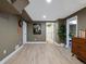 Finished basement offers extra living space with neutral walls and wood-look floors at 8915 W Quarto Pl, Littleton, CO 80128