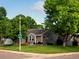 Charming corner lot home boasts manicured lawn, inviting front porch, and mature trees at 8915 W Quarto Pl, Littleton, CO 80128