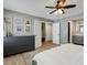 Spacious main bedroom leading to a walk-in closet and the main bathroom at 8915 W Quarto Pl, Littleton, CO 80128