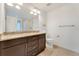 Bathroom with granite countertop and double vanity at 7932 E 49Th Pl, Denver, CO 80238