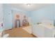 Bedroom with a single bed and light blue walls at 7932 E 49Th Pl, Denver, CO 80238