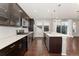 Modern kitchen with stainless steel appliances and an island at 7932 E 49Th Pl, Denver, CO 80238