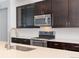 Modern kitchen features with stainless steel appliances at 7932 E 49Th Pl, Denver, CO 80238