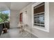 Charming balcony with bistro set, potted plant, and sunlit view, ideal for unwinding at 7110 S Gaylord St # O7, Centennial, CO 80122
