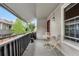 Cozy balcony with outdoor furniture, greenery, and natural light, perfect for relaxing at 7110 S Gaylord St # O7, Centennial, CO 80122