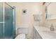 Full bathroom featuring a glass shower, a toilet, and a vanity with sink at 7110 S Gaylord St # O7, Centennial, CO 80122