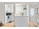 Bright kitchen with white cabinets and modern appliances at 7110 S Gaylord St # O7, Centennial, CO 80122