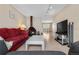 Inviting living room with wood floors, cozy fireplace, and open layout to dining area at 7110 S Gaylord St # O7, Centennial, CO 80122