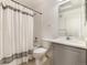 Bathroom with shower and tub combination, vanity area and modern fixtures at 18489 E Columbia Cir, Aurora, CO 80013