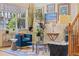 Bright living room with plants, a tall window and nice decor at 18489 E Columbia Cir, Aurora, CO 80013