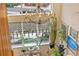 Open living room with high ceilings and grand chandelier viewed from above at 18489 E Columbia Cir, Aurora, CO 80013