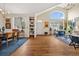 Open living space with hardwood floors and a combination of dining and living areas at 18489 E Columbia Cir, Aurora, CO 80013