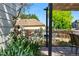 Backyard with patio, flowers, and outdoor seating, offering a serene space for relaxation and entertaining at 2390 N Springwood Ct, Lafayette, CO 80026