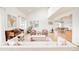 Open-concept living room boasts vaulted ceilings, a piano, and lots of natural light at 3970 Longwood Ave, Boulder, CO 80305
