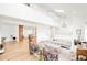 Spacious living room with open layout, piano, and bright, natural light at 3970 Longwood Ave, Boulder, CO 80305
