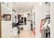 Large walk-in closet with custom shelving and ample storage space for clothes at 3970 Longwood Ave, Boulder, CO 80305