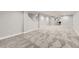 Large finished basement with carpet and access to other rooms, creating a versatile living space at 6635 S Sherman St, Centennial, CO 80121