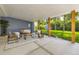 Inviting covered patio with stylish outdoor furniture, perfect for relaxing and entertaining at 6635 S Sherman St, Centennial, CO 80121