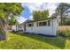 Charming single-story home featuring a well-manicured lawn, inviting curb appeal, and a cozy front entrance at 6635 S Sherman St, Centennial, CO 80121