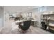 Inviting living room with neutral tones, stylish furniture, and ample natural light at 6635 S Sherman St, Centennial, CO 80121