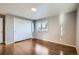 Bedroom with lots of closet space and a large window at 2925 S Ingalls Way, Denver, CO 80227