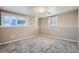 Spacious bedroom featuring neutral walls, carpeted floors, and ample natural light at 2925 S Ingalls Way, Denver, CO 80227