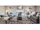 Inviting living room features a cozy fireplace and comfortable seating at 2925 S Ingalls Way, Denver, CO 80227