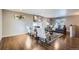 Open-concept living room with a fireplace and stylish decor at 2925 S Ingalls Way, Denver, CO 80227