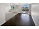 Basement area featuring plush carpet, sleek tile flooring and sliding glass doors to an outdoor area at 2418 W 82Nd Pl # D, Westminster, CO 80031