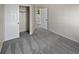 Cozy bedroom featuring a closet, plush carpet, and natural light at 2418 W 82Nd Pl # D, Westminster, CO 80031