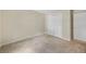 Neutral bedroom featuring carpeted floors, closet and a door, painted in light, calming colors at 395 Raspberry Ln, Monument, CO 80132