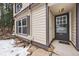 Inviting front entrance showcasing a charming door and well-maintained exterior at 395 Raspberry Ln, Monument, CO 80132